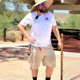 a man holding a baseball bat